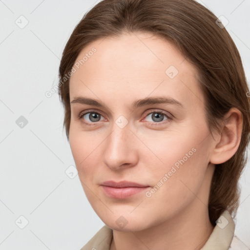 Neutral white young-adult female with medium  brown hair and grey eyes