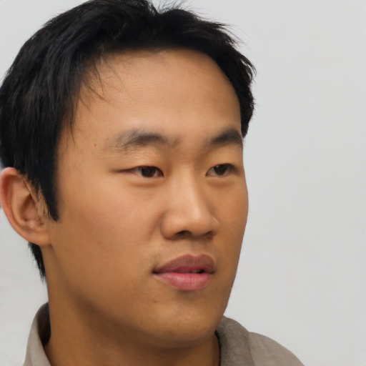 Neutral asian young-adult male with short  brown hair and brown eyes