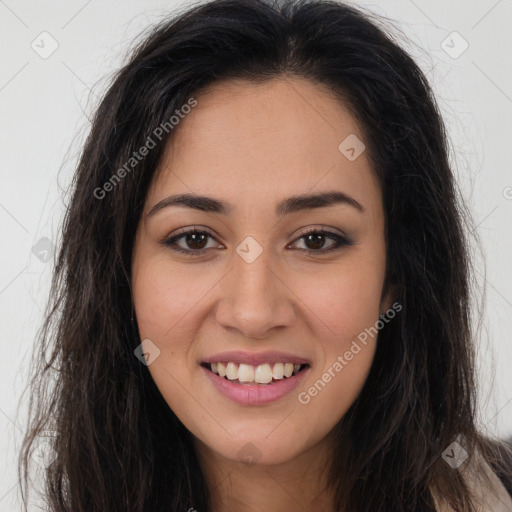 Joyful latino young-adult female with long  brown hair and brown eyes