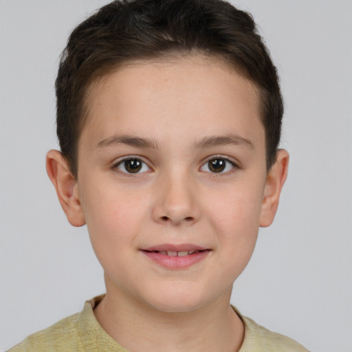 Joyful white child female with short  brown hair and brown eyes