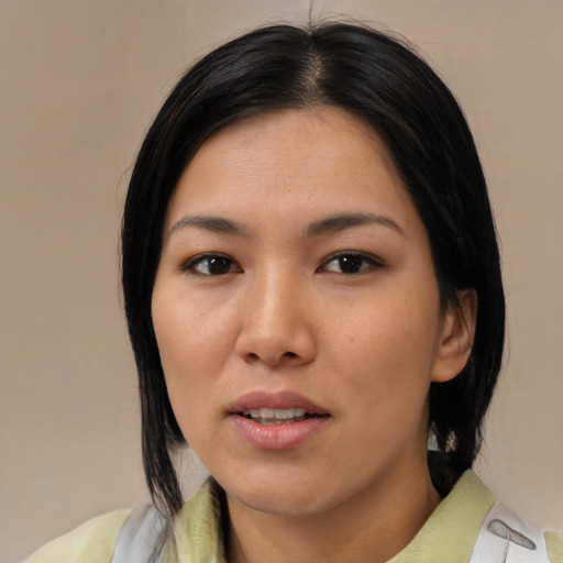 Neutral asian young-adult female with medium  black hair and brown eyes