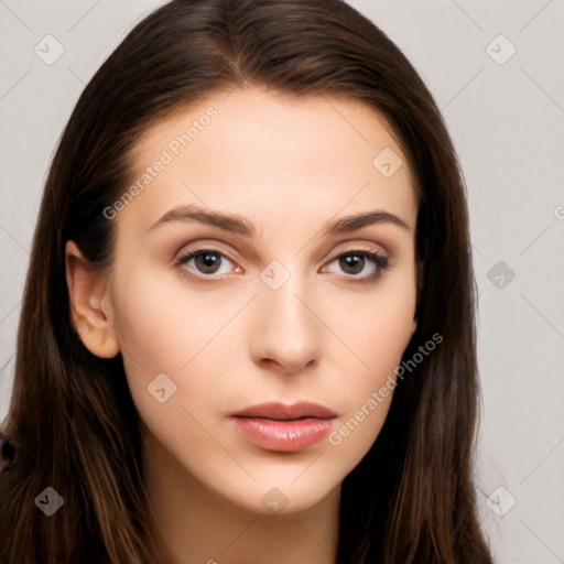 Neutral white young-adult female with long  brown hair and brown eyes