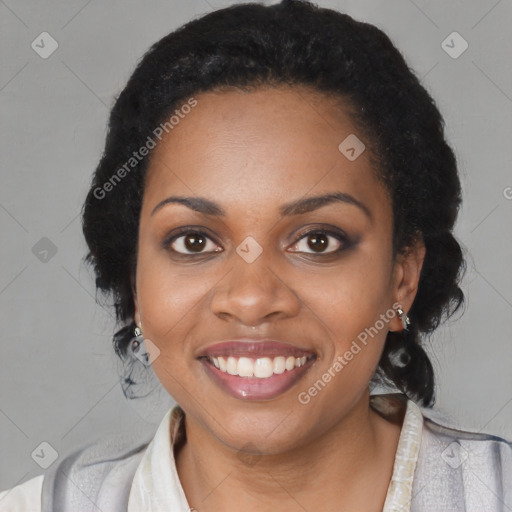 Joyful black young-adult female with medium  black hair and brown eyes