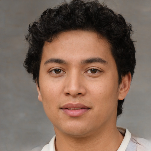 Neutral latino young-adult male with short  brown hair and brown eyes