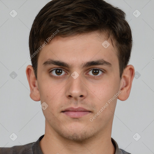 Neutral white young-adult male with short  brown hair and brown eyes