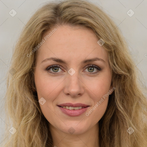 Joyful white young-adult female with long  brown hair and green eyes