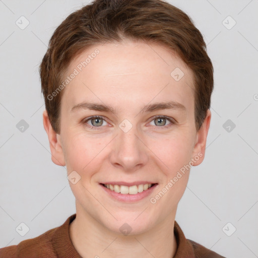 Joyful white young-adult female with short  brown hair and grey eyes