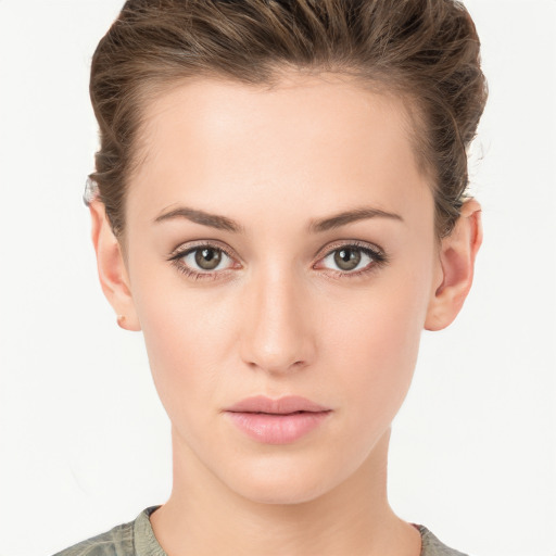 Neutral white young-adult female with short  brown hair and brown eyes