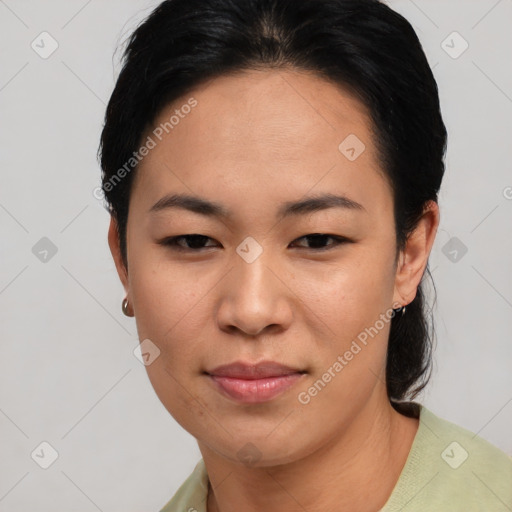 Joyful asian young-adult female with short  black hair and brown eyes