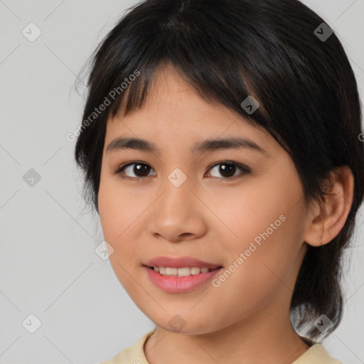 Joyful asian young-adult female with medium  brown hair and brown eyes