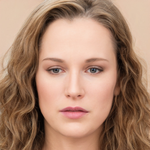 Neutral white young-adult female with long  brown hair and green eyes