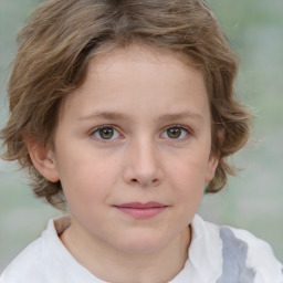 Joyful white child female with short  brown hair and brown eyes