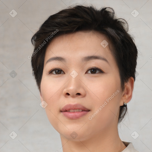 Joyful asian young-adult female with medium  brown hair and brown eyes