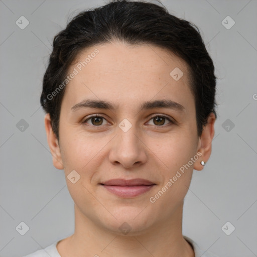 Joyful white young-adult female with short  brown hair and brown eyes