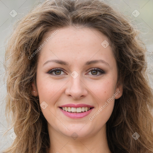 Joyful white young-adult female with long  brown hair and green eyes