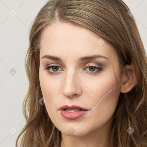 Neutral white young-adult female with long  brown hair and brown eyes