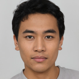 Neutral asian young-adult male with short  black hair and brown eyes