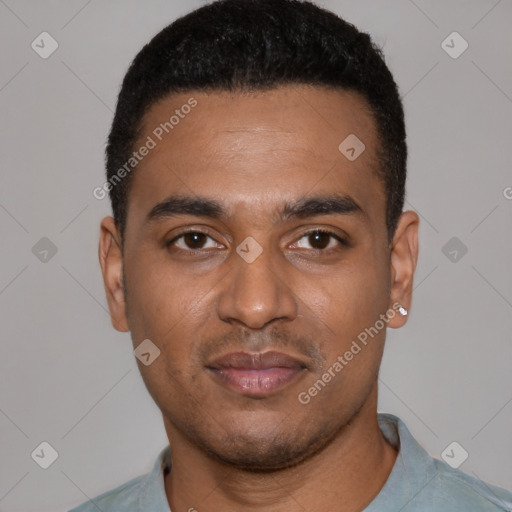 Joyful black young-adult male with short  black hair and brown eyes