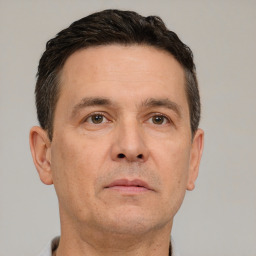 Neutral white adult male with short  brown hair and brown eyes