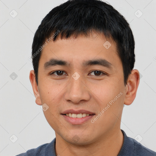 Joyful white young-adult male with short  black hair and brown eyes