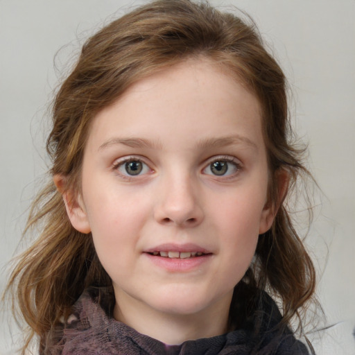 Joyful white child female with medium  brown hair and blue eyes