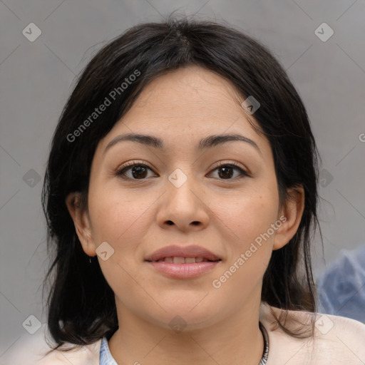 Joyful latino young-adult female with medium  brown hair and brown eyes