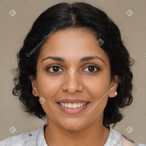 Joyful latino young-adult female with medium  brown hair and brown eyes