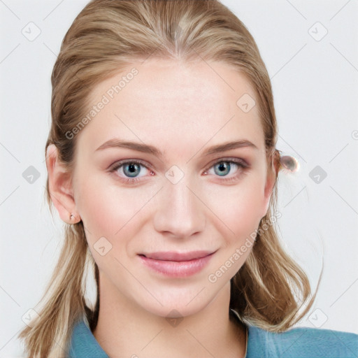 Joyful white young-adult female with medium  brown hair and blue eyes