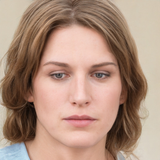 Neutral white young-adult female with medium  brown hair and green eyes