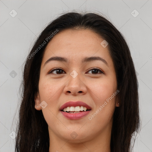 Joyful asian young-adult female with long  brown hair and brown eyes