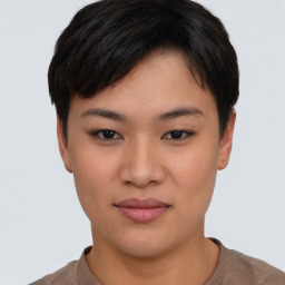 Joyful asian young-adult female with short  brown hair and brown eyes