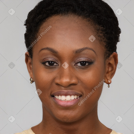 Joyful black young-adult female with short  brown hair and brown eyes