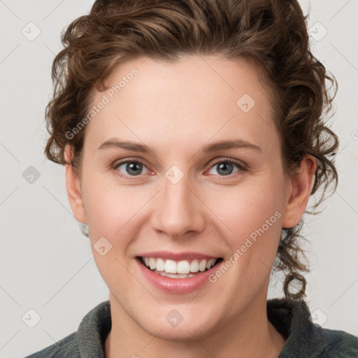 Joyful white young-adult female with medium  brown hair and green eyes