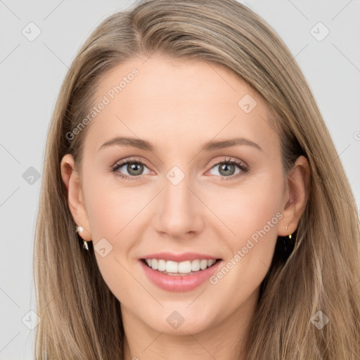 Joyful white young-adult female with long  brown hair and grey eyes