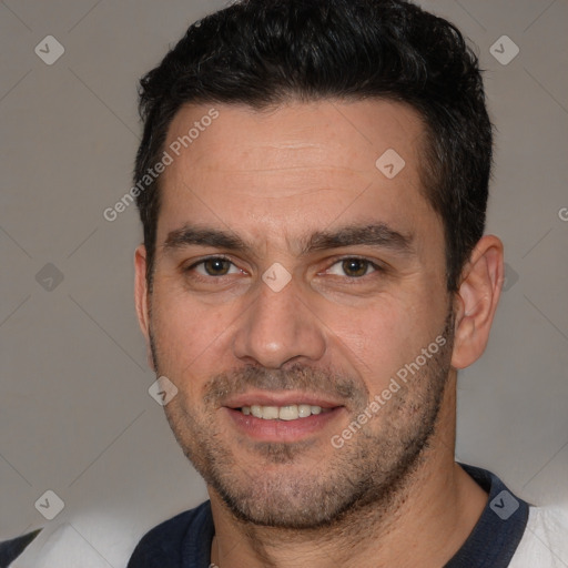 Joyful white adult male with short  brown hair and brown eyes