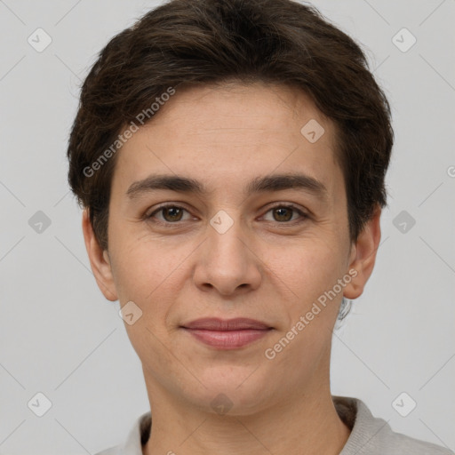 Joyful white young-adult female with short  brown hair and grey eyes