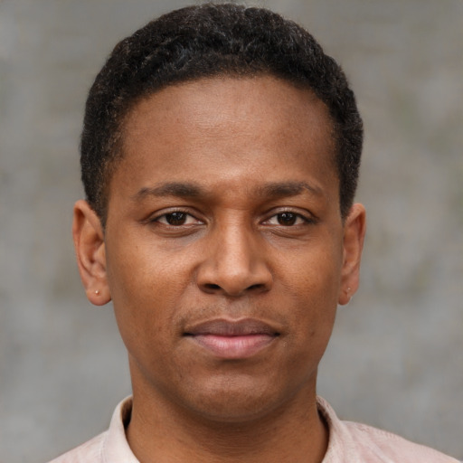 Neutral latino young-adult male with short  brown hair and brown eyes
