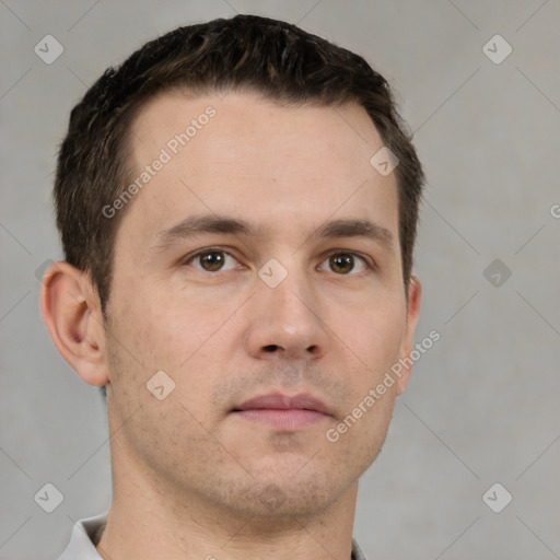 Neutral white young-adult male with short  brown hair and brown eyes