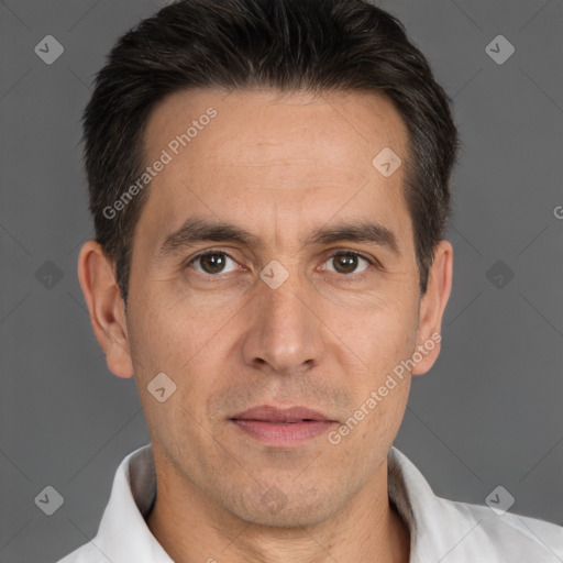 Joyful white adult male with short  brown hair and brown eyes