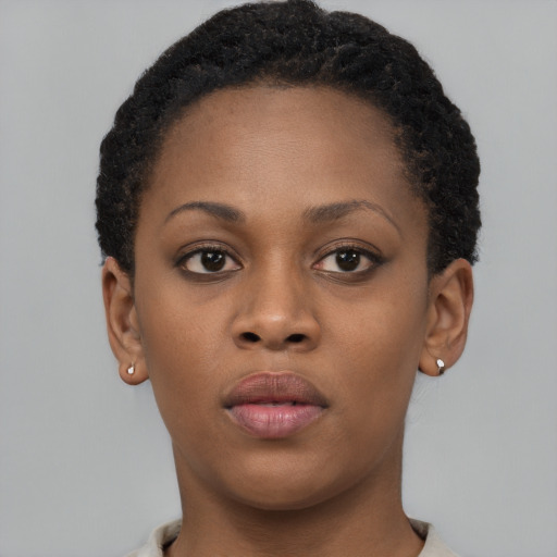 Neutral black young-adult female with short  brown hair and brown eyes
