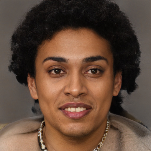 Joyful black young-adult female with short  black hair and brown eyes