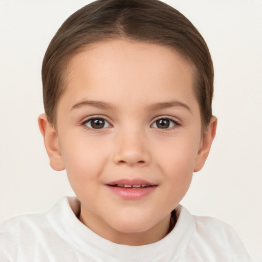 Joyful white child female with short  brown hair and brown eyes