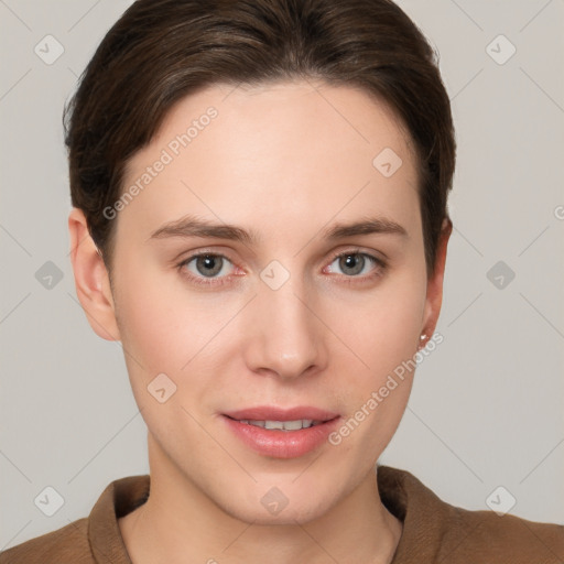 Joyful white young-adult female with short  brown hair and grey eyes