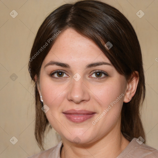 Joyful white young-adult female with medium  brown hair and brown eyes