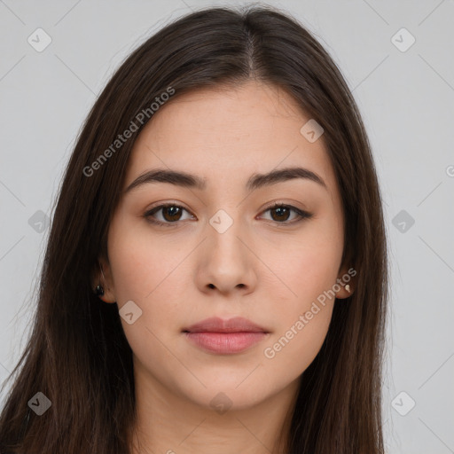 Neutral white young-adult female with long  brown hair and brown eyes