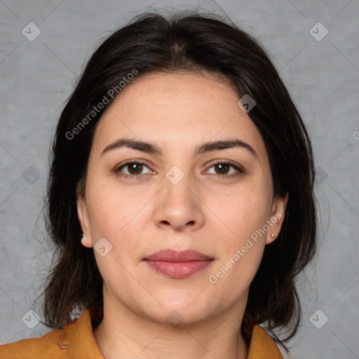 Joyful white adult female with medium  brown hair and brown eyes