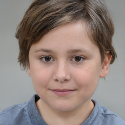 Joyful white child female with short  brown hair and brown eyes