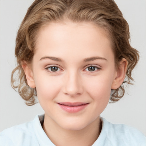 Joyful white child female with medium  brown hair and brown eyes