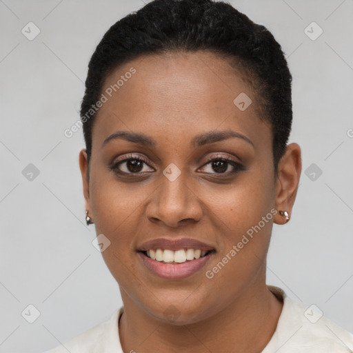 Joyful black young-adult female with short  brown hair and brown eyes