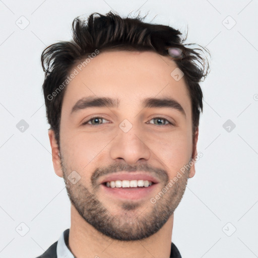 Joyful white young-adult male with short  black hair and brown eyes